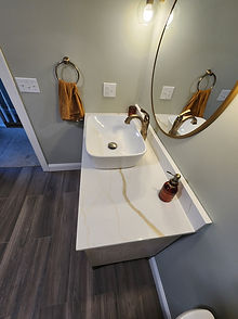 Marble Vanity with Vessel Sink and Round Mirror