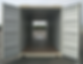 Empty white shipping container with open double doors.