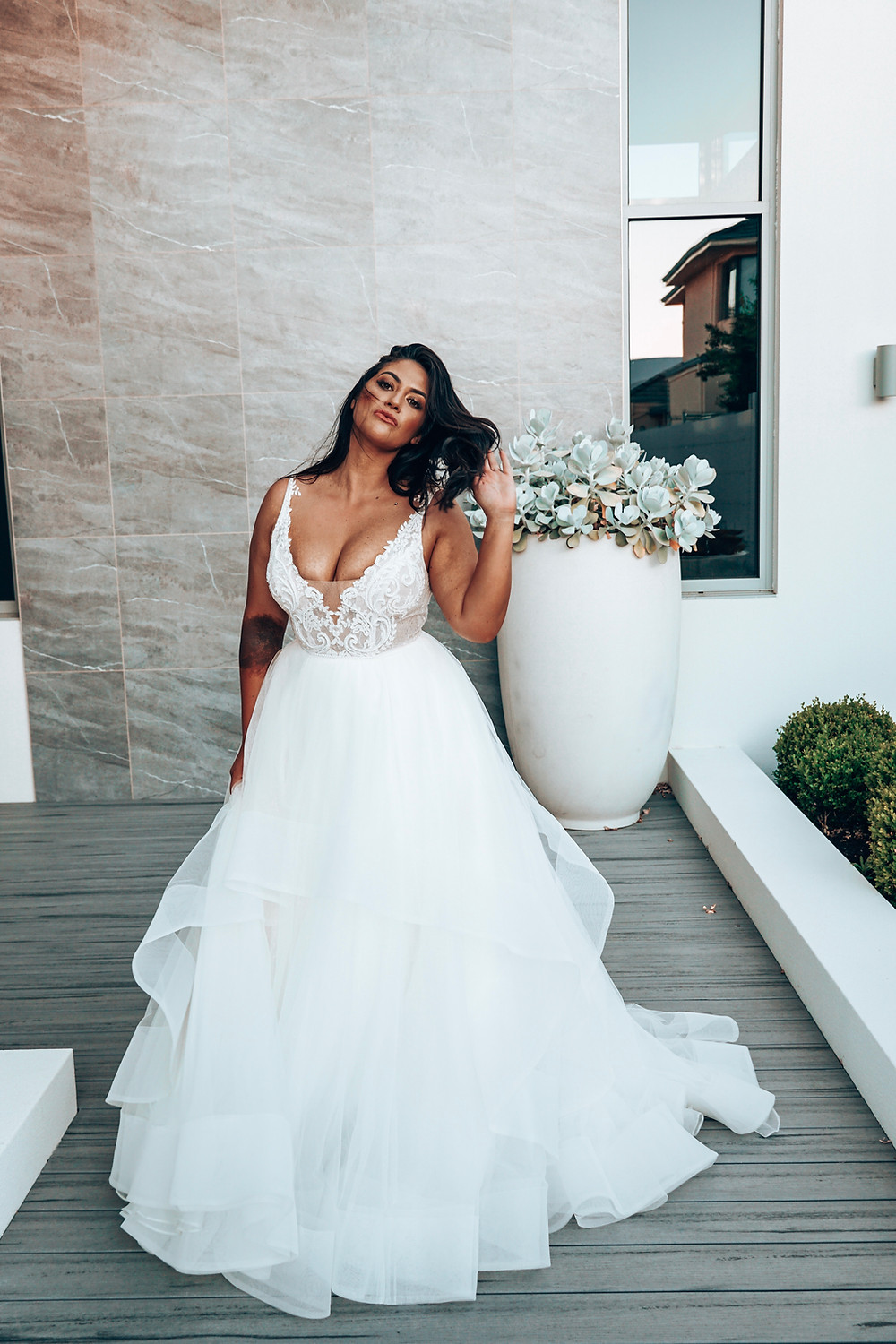 Cloud by Rachel Rose. Wedding dress suggestion for pear / triangle shaped bride. Layered tulle skirt ballgown with embroidery detail bodice.