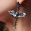 Thumbnail: BAT EARRINGS WITH SPINE LINKS BLACK AND WHITE DIAMONDS ON CLAW SETTINGS