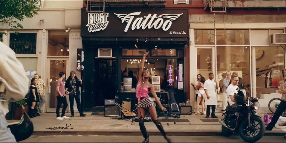 Eye-level view of a tattoo studio interior with clean and organized workstations