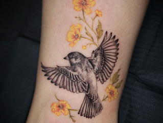 Mixing Styles with Fine Line Tattoos