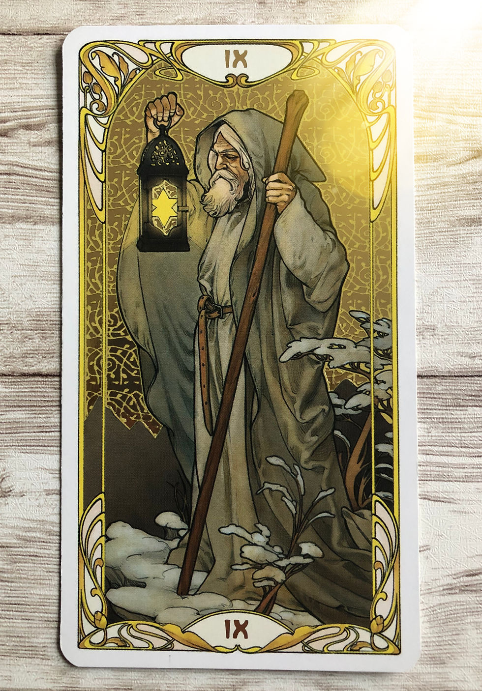 The Hermit Tarot card from the Golden Art Nouveau Tarot
