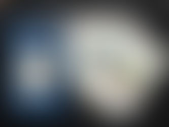 Tarot deck box "Star and Strength" with cards featuring designs and text upright on a textured black surface.