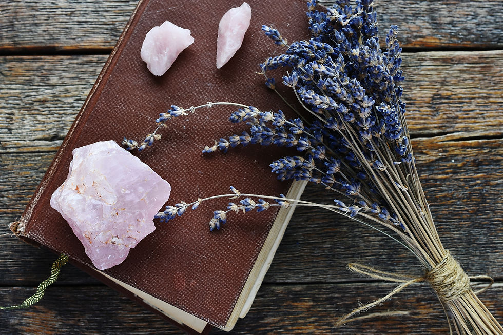 A tarot journal with lavender and crystals.