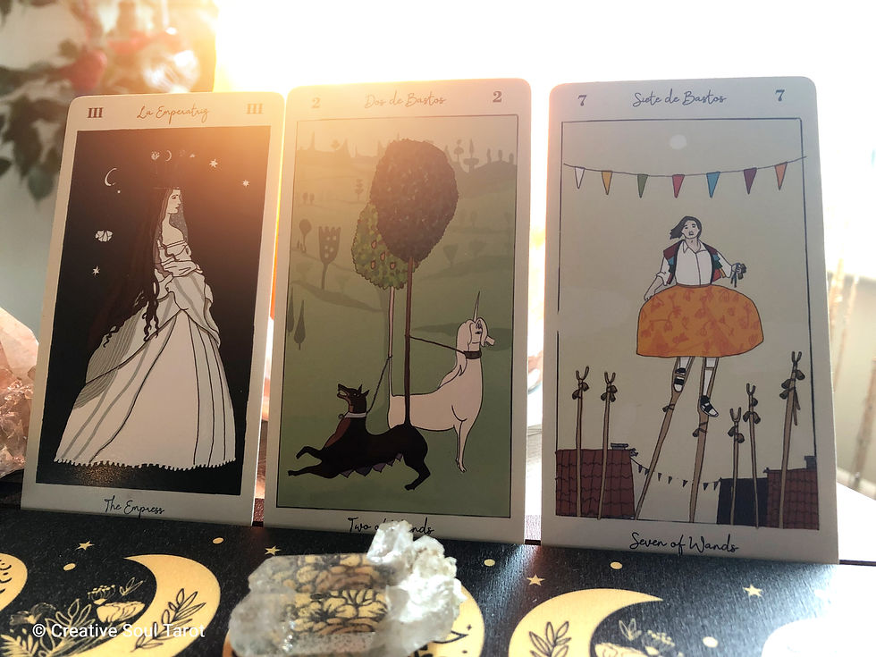 The Empress, 2 of Wands, 7 of Wands tarot cards