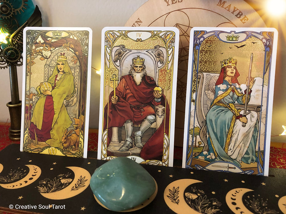 Queen of Pentacles, The Emperor, Queen of Swords tarot cards.