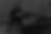 man in black crew neck t-shirt and blue denim jeans sitting on gray couch_edited.jpg