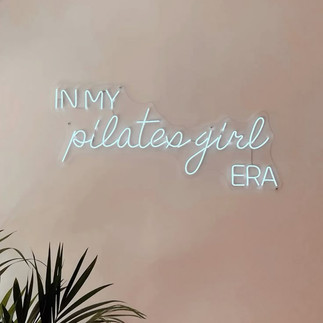 a sign that reads "in my pilates princess era"