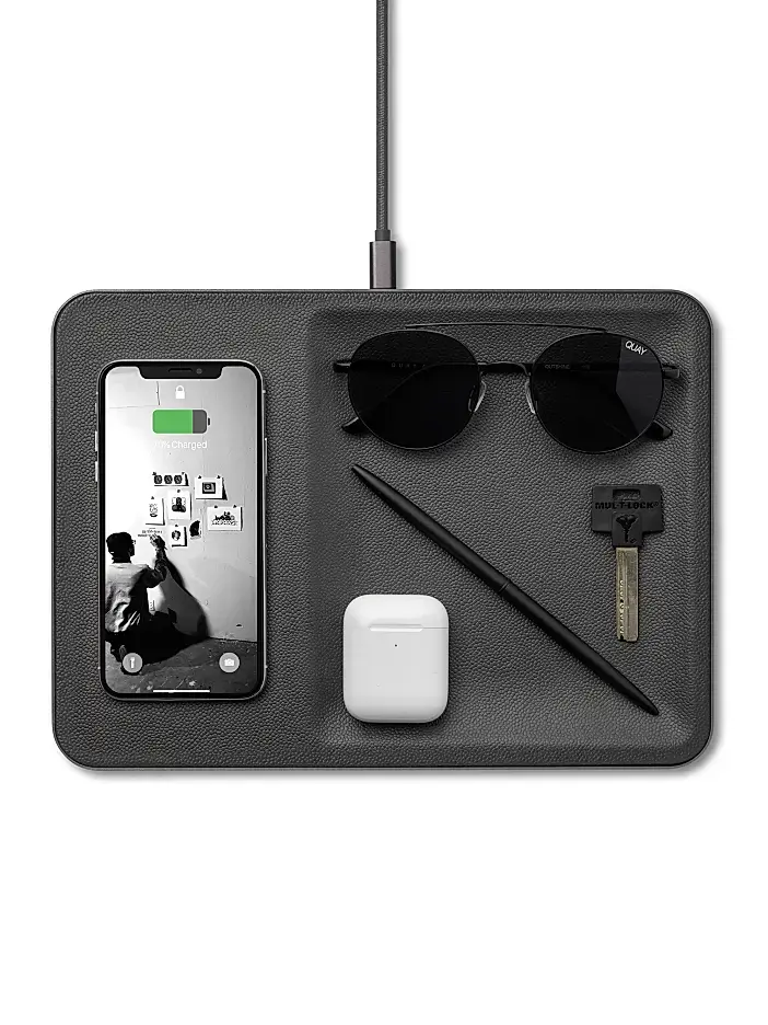 “Courant Catch:3 wireless charging tray in leather, a modern charging and valet station for men.”