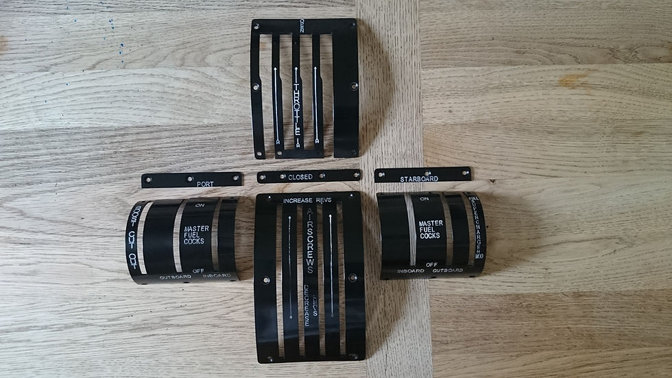 Thumbnail: A complete set of engraved aluminium Lancaster throttle plates painted in black