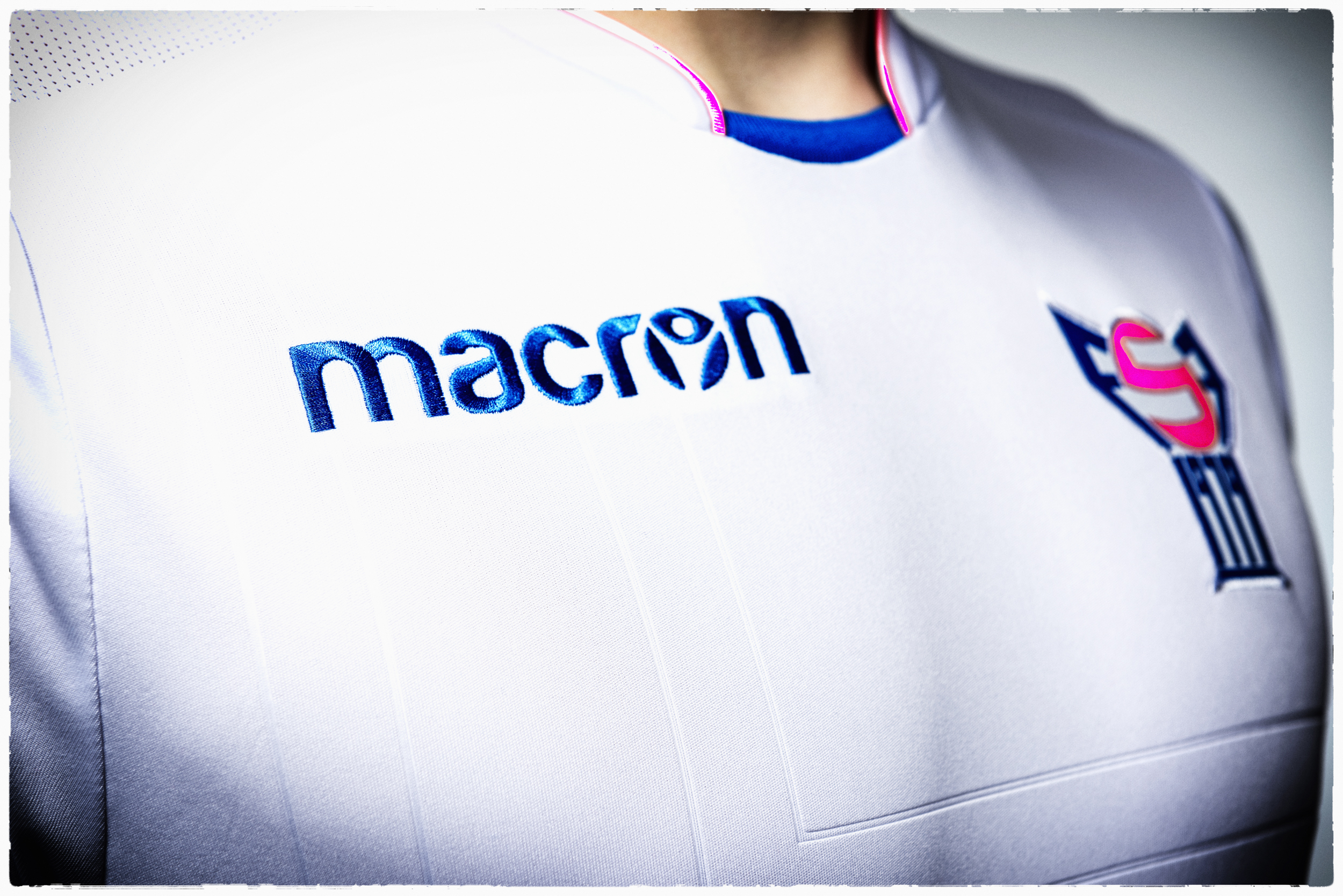Macron football clothing.