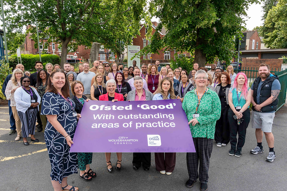 Councillor Jacqui Coogan, the City of Wolverhampton Council's Cabinet Member for Children, Young People and Education (centre), joins staff to celebrate Children's Social Care Services' Good Ofsted inspection outcome.