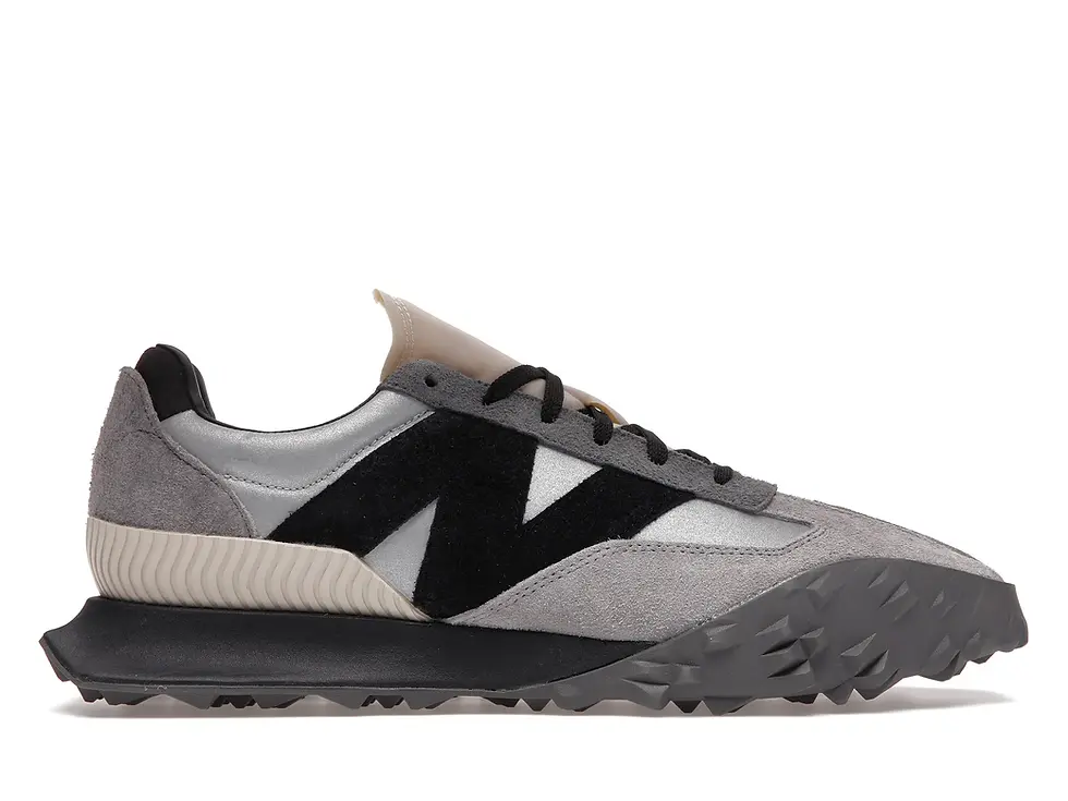 New Balance XC-72 sneaker, grey and black, featuring prominent N logo.