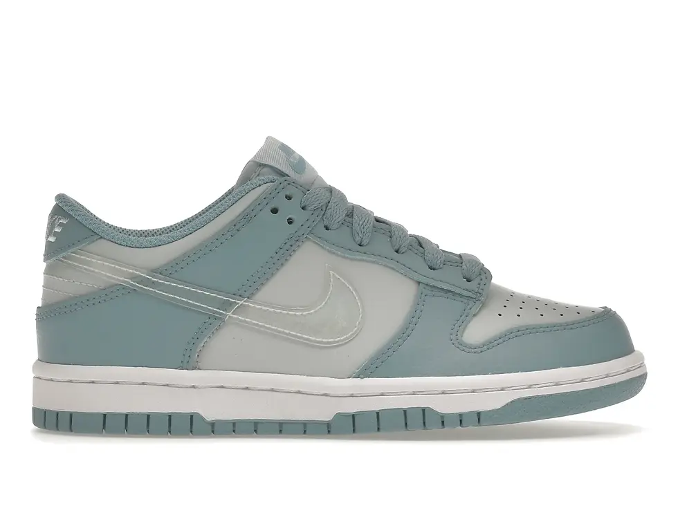 Nike Dunk Low sneaker, light green and off-white color scheme.