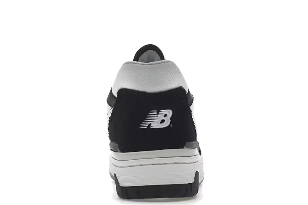Rear view of black and white New Balance sneaker with NB logo.