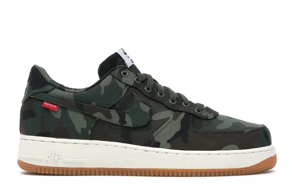 Green camouflage Nike Air Force 1 sneaker, white midsole, and gum outsole.