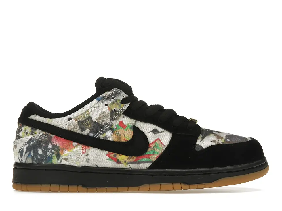 Black Nike low-top sneaker features unique collage print and a gum sole.