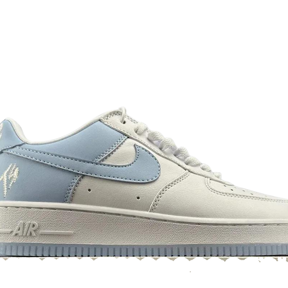 Cream and light blue Nike Air Force 1 sneaker, 'AIR' on sole.