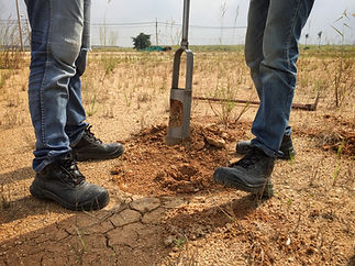 Soil boring and soil sampling by Soil drill. The concept of soil quality and environmental