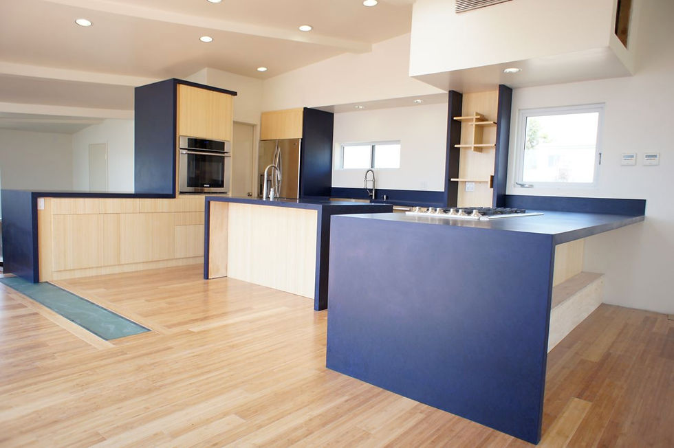 Modern kitchen design featuring blue canyon installation, complemented by wooden cabinetry and flooring