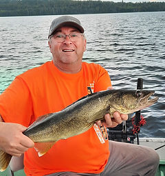 Experience Trophy Walleye Fishing at Sasseginaga Outpost Lodge in Quebec, Canada  Discover an unforgettable remote fishing experience in Quebec, Canada at Sasseginaga Outpost Lodge. Our off-grid Canadian fishing outfitter, located on Lake Sasseginaga, invites you to indulge in trophy walleye fishing, along with the thrill of catching trophy northern pike and lake trout.  Key Features:  Off-Grid Wilderness: Sasseginaga Outpost Lodge offers an off-grid experience with the convenience of housekeeping facilities, providing you with the comforts of home amidst the wilderness.  Prime Location: Nestled in west-central Quebec, just a short drive from Ontario, Canada, our lodge is easily accessible. The nearest town is Temiscaming along the Ottawa River in Quebec.  Notable Nearby Locations: Explore the rich fishing grounds around Sasseginaga Outpost, including Lake Ogascanan's Lodge, Camp Coucoushee on Lake Kikwissi, Bush Country Camp, Lake Pomeroy, and Lake Kipawa.  ZEC Kipawa Area: Lake Sasse
