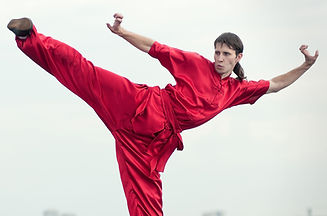 Man in Red Practicing Kung Fu