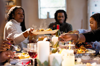 Family-gathered-around-table-for-dinner