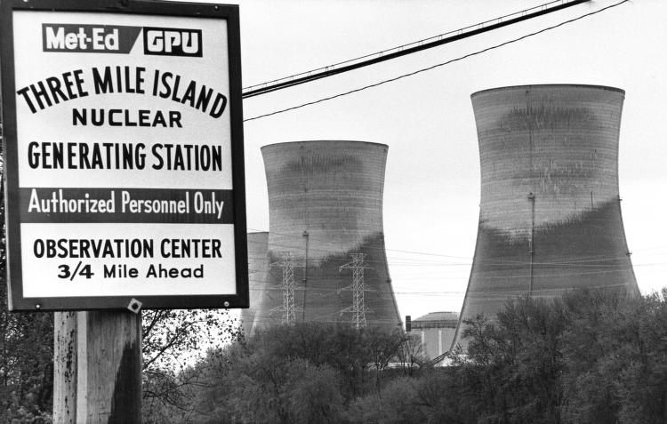 Three Mile Island Towers with plant sign in foreground. Photo courtesy of the University of Pittsburgh