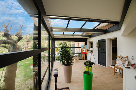extension avec toiture fixe et puit de lumière