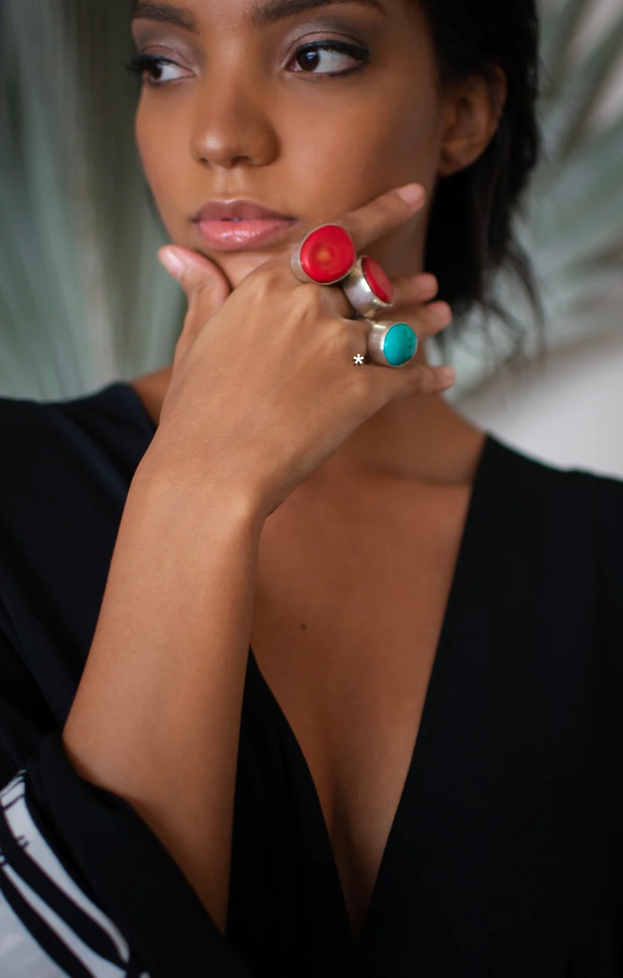 Model wearing three Turquoise Sterling Silver Rings