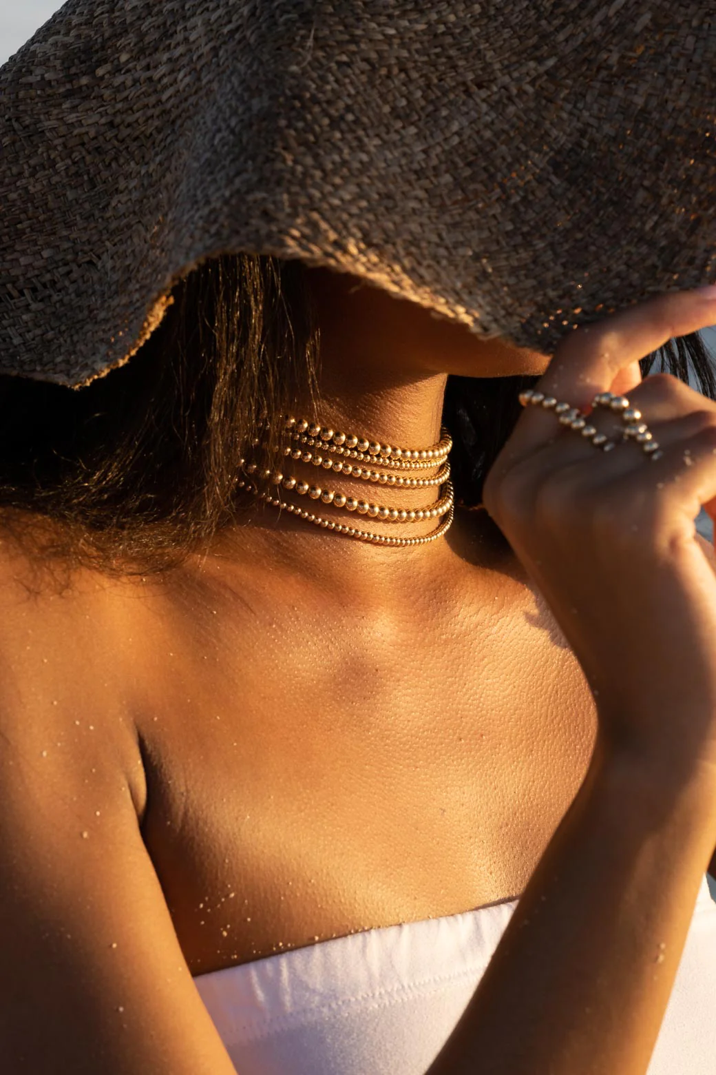 Model wearing 14K Gold Filled Yellow Choker and rings