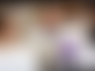 Three individuals in a laboratory setting conducting scientific research.