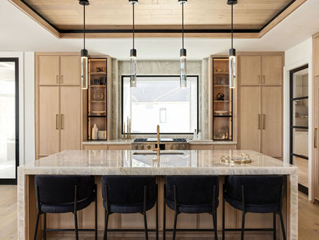 Modern luxury kitchen with rift sawn white oak wood and Cristalo quartz countertops