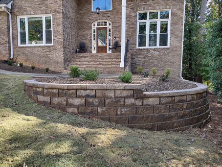 What is a weep hole in a retaining wall?