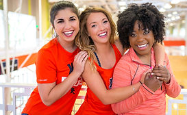 Female Auburn students in the gym