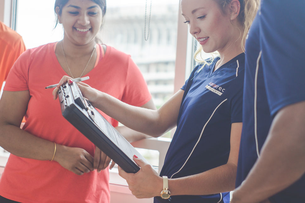 Personal trainer with client