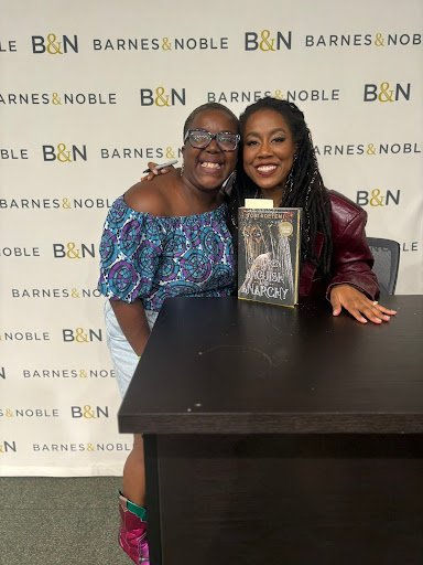 Odochi Ibe and Tomi Adeyemi share a moment during Adeyemi's book signing event at Barnes & Noble, Union Square, June 2024.