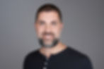 An executive headshot capturing the essence of leadership and professionalism