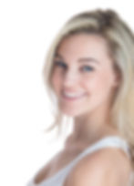 A stunning headshot featuring a blonde in a chic white top