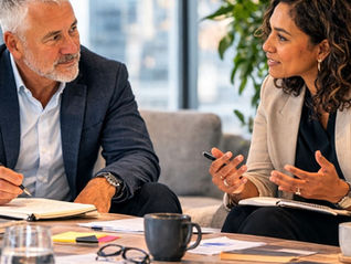 Two leaders discussing how Leader Identity Shifts During Transformation