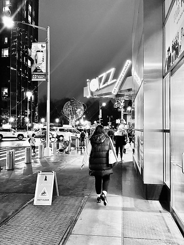 Scene from Columbus Circle in Manhattan showing the sign for Jazz at Lincoln Center.