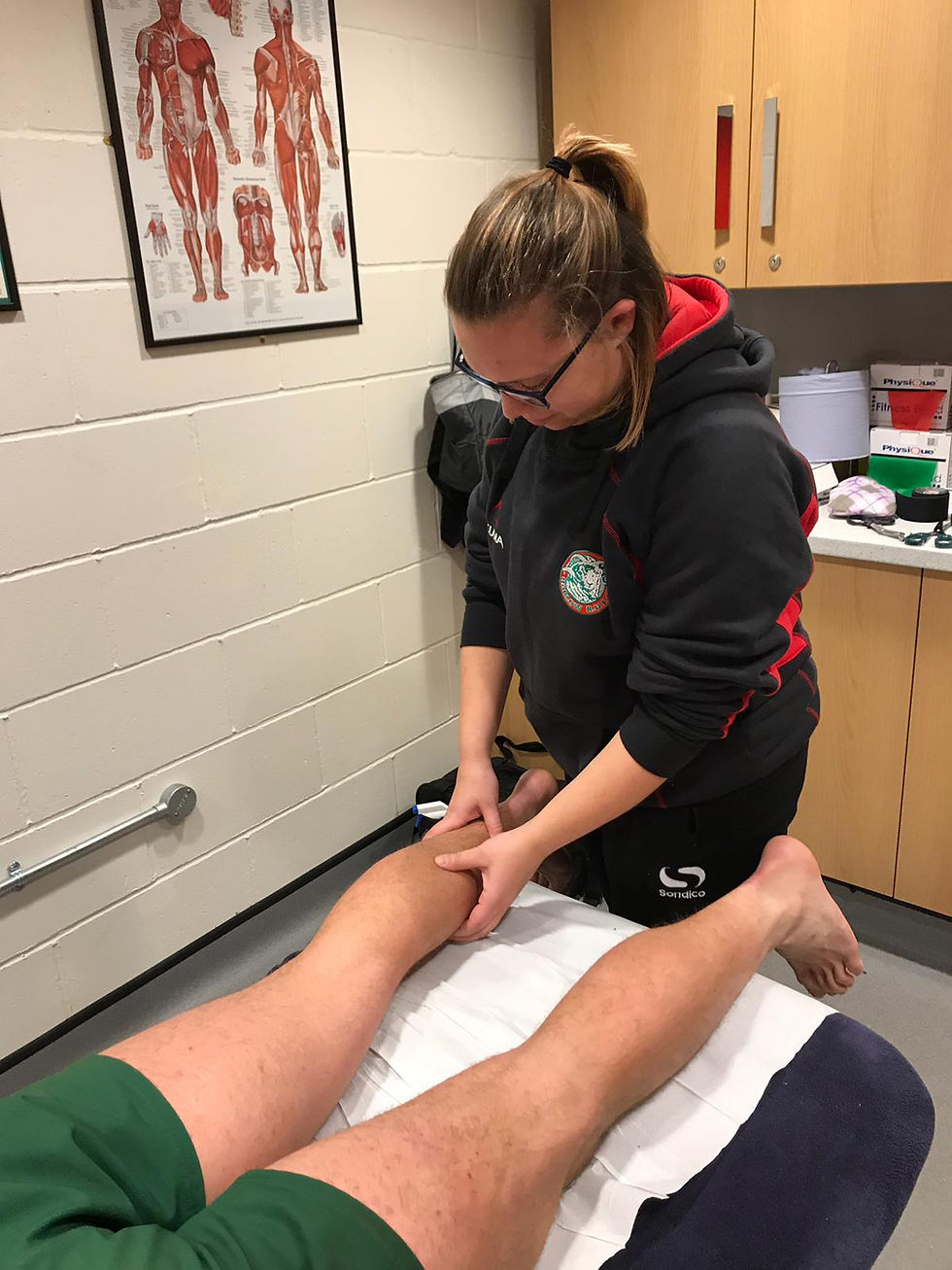 Nicole treating Harlow RUFC player