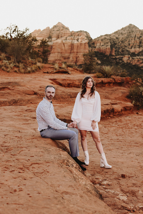 Sedona Engagement Photoshoot couple surrounded by red rocks