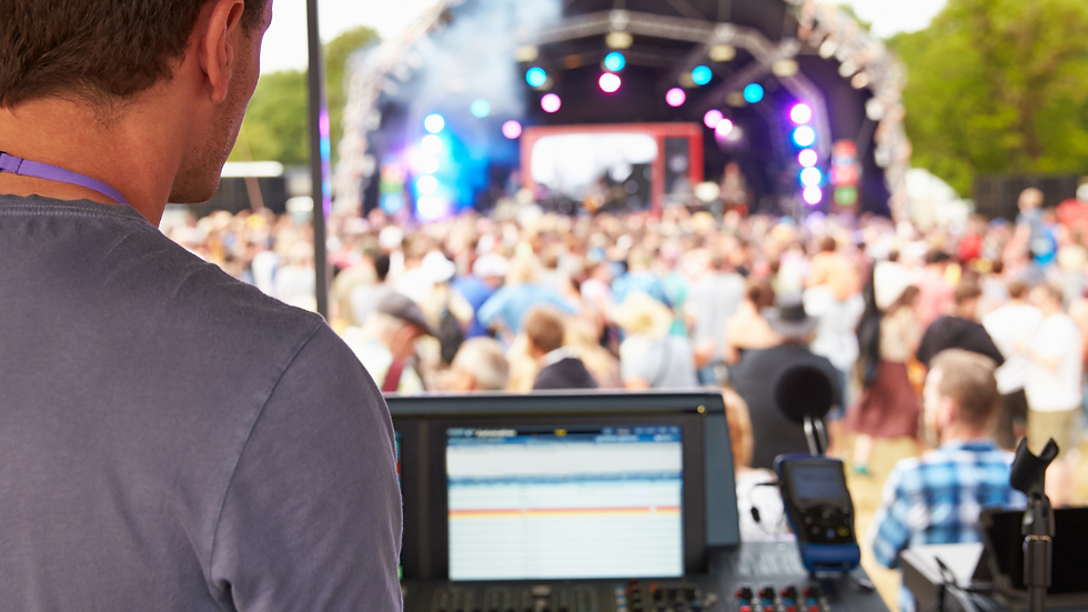 Main image showing live event technical team managing AV, lighting, and WiFi setups