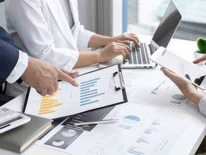 man showing statistic on paper