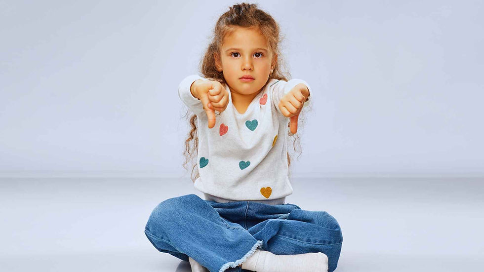 Girl gives both thumbs down and is disappointed