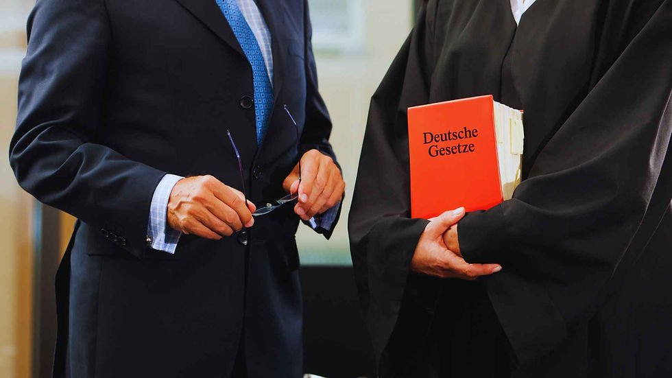 german immigration lawyer holding immigration law book