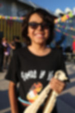 Kaleb Nunez, Somos La Voz percussionist, holding his quijada at Fandango Fronterizo