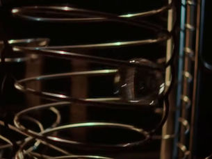 Stainless steel rolling ball sculpture tracks and spirals